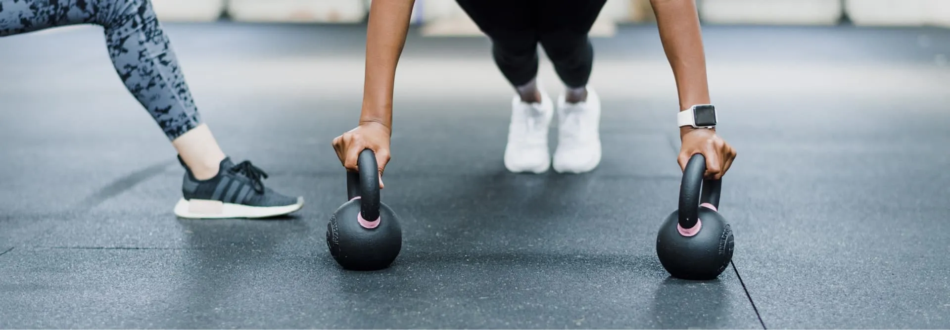 Members doing kettlebell movement work at Title 29 Fitness in Fresno